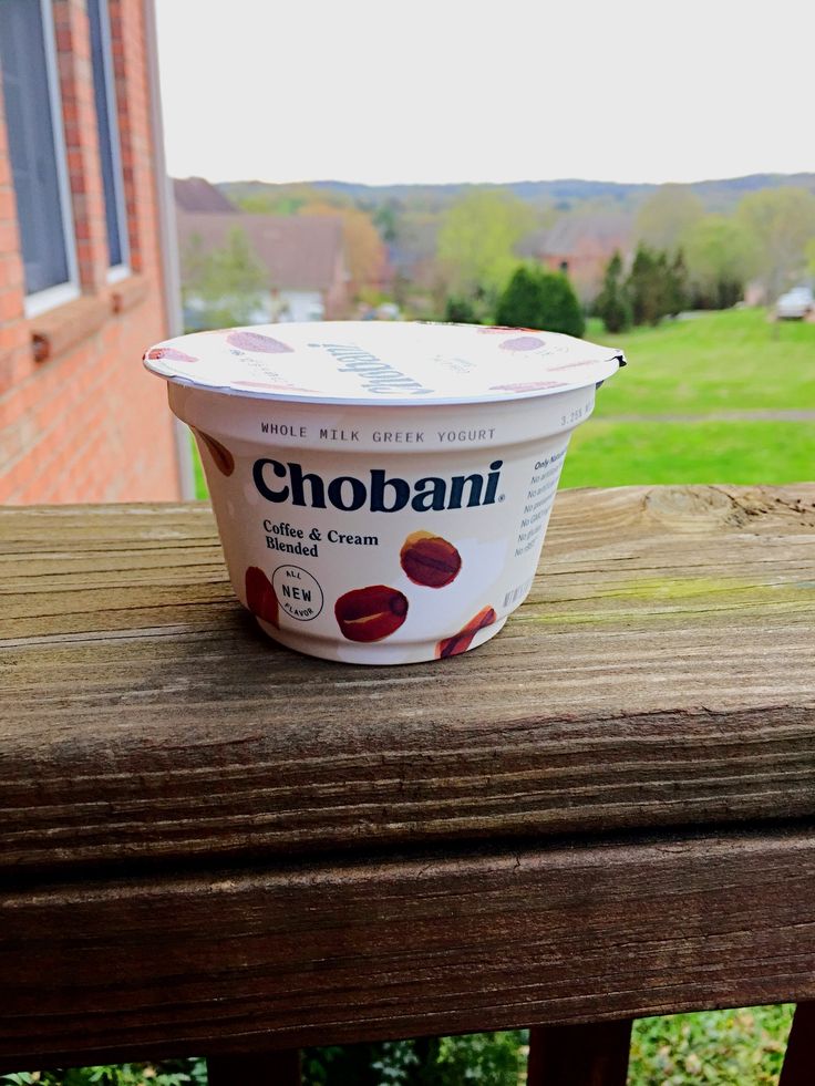 A Bowl Of Ice Cream Sitting On Top Of A Wooden Bench a-bowl-of-ice-cream-sitting-on-top-of-a-wooden-bench