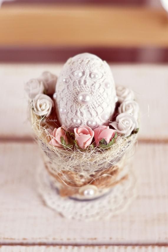 Easter flower arrangement with an egg in a pot in a chebbi chic style, Easter decor on the table center for home decoration, Easter gift