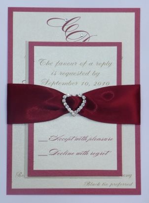 Double Layered Wedding Invitation Bottom Layer Is A Deep Red Double Layered Wedding Invitation Bottom Layer Is A Deep Red Metallic And Top Cream Bride Grooms Initials Are Adorned Wit