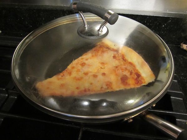 The Best Way To Reheat Pizza | Reheat pizza, Reheat pizza in skillet, Cooking recipes