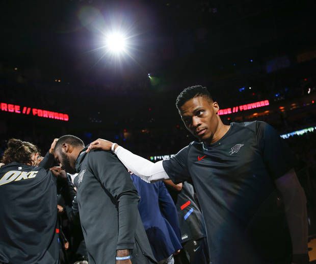Oklahoma City's Russell Westbrook (0) with the team huddle before an NBA bas...