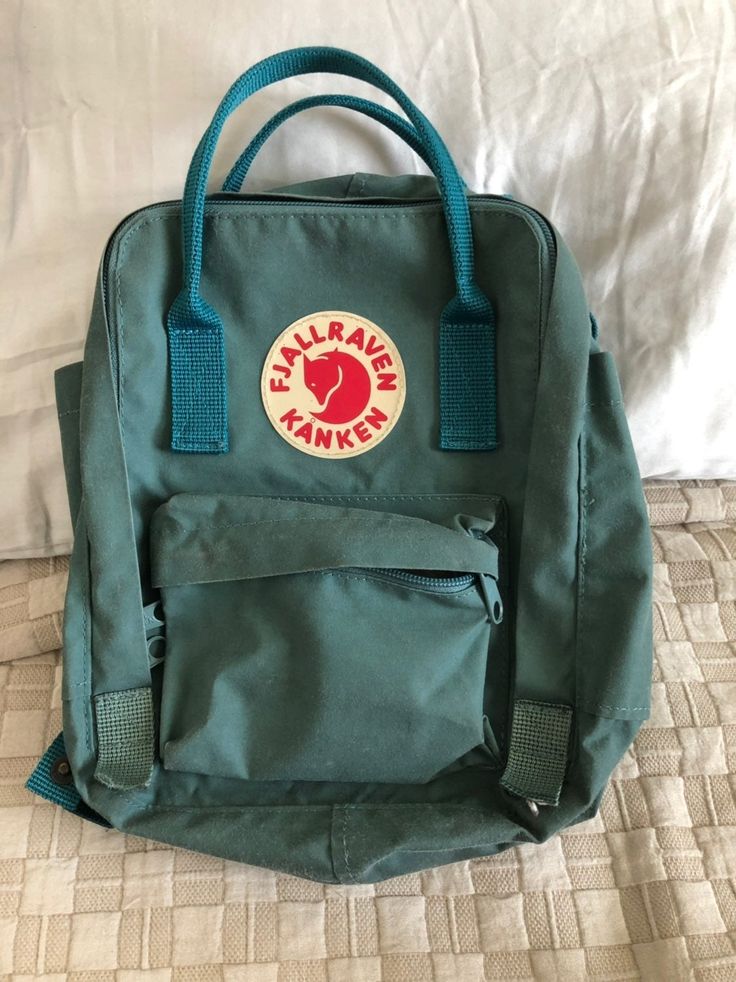 Teal color! Gently used fjallraven mini classic backpack. DM for ... افالون Teal color! Gently used fjallraven mini classic backpack. DM for ... افالون