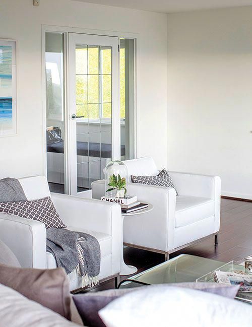 Prevent An All White Room From Feeling Too Clinical By Adding Prevent An All White Room From Feeling Too Clinical By Adding Accessories That Run The Spectrum Charcoal Grey To Warm Mauve Livingroom Whitearmchair