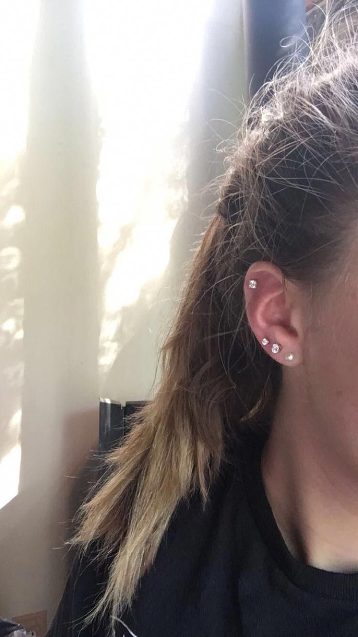 this is my ear, I pierced my third holes at home yesterday! love how it turned o...