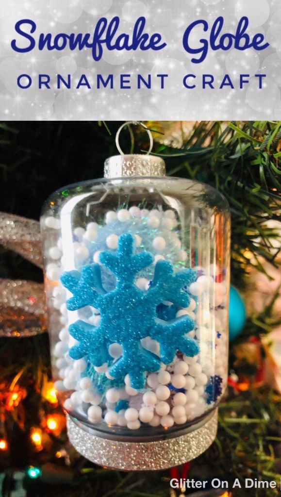 Christmas Photo Snow globe with glitter snowflakes and snow.