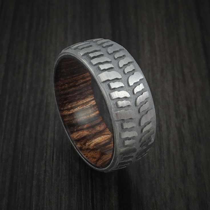 titanium mud tread tire ring with heritage brown hard wood sleeve custom made - Mud Tire Wedding Rings titanium mud tread tire ring with heritage brown hard wood sleeve custom made - Mud Tire Wedding Rings