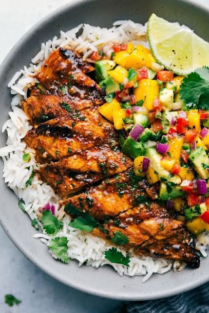 Cilantro-Lime Chicken with a Mango Avocado Salsa - This cilantro lime chicken is...