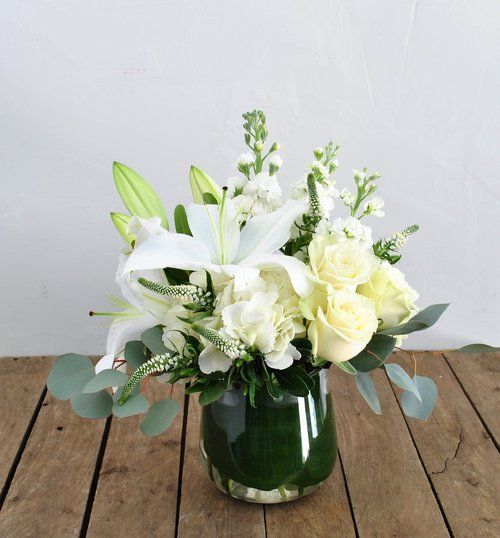 A Crisp And Classic White Color Palette Including Fragrant Stock