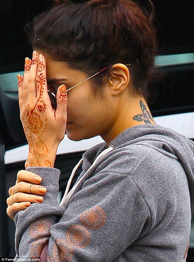 vanessa hudgens flashes a henna tattoo on her left hand vanessa hudgens flashes a henna tattoo on her left hand