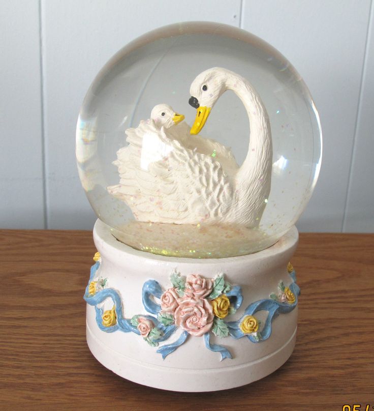 swans in snow globe music box plays swan lake ballet swans in snow globe music box plays swan lake ballet