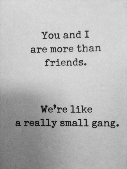 an old typewriter with the words you and i are more than friends we're like a really small gang