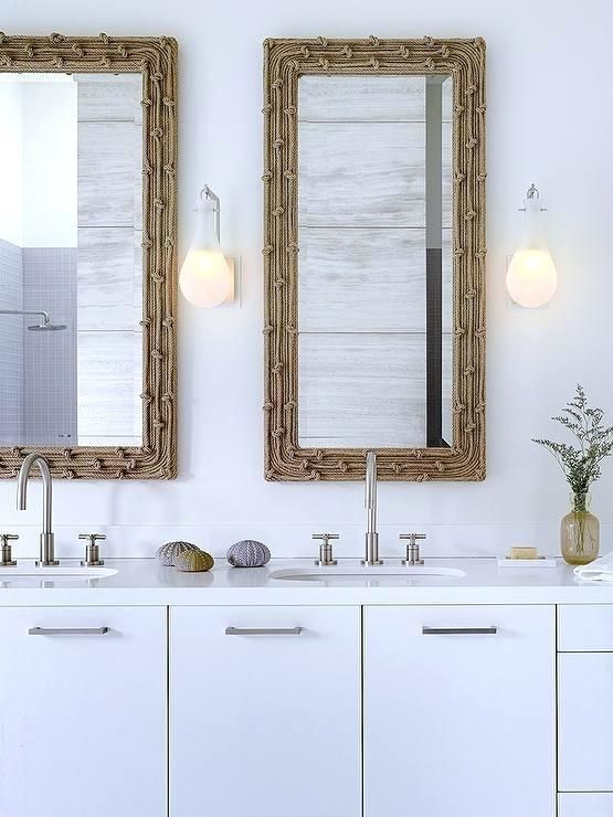 Beachy Bathroom Mirrors Modern Coastal Features A White Beachy Bathroom Mirrors Modern Coastal Features A White Dual Washstand Ed With Flat Front Cabinets Topped Quartz Framing His And