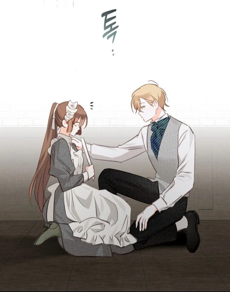 Two people sitting on the floor in front of a white wall and one person