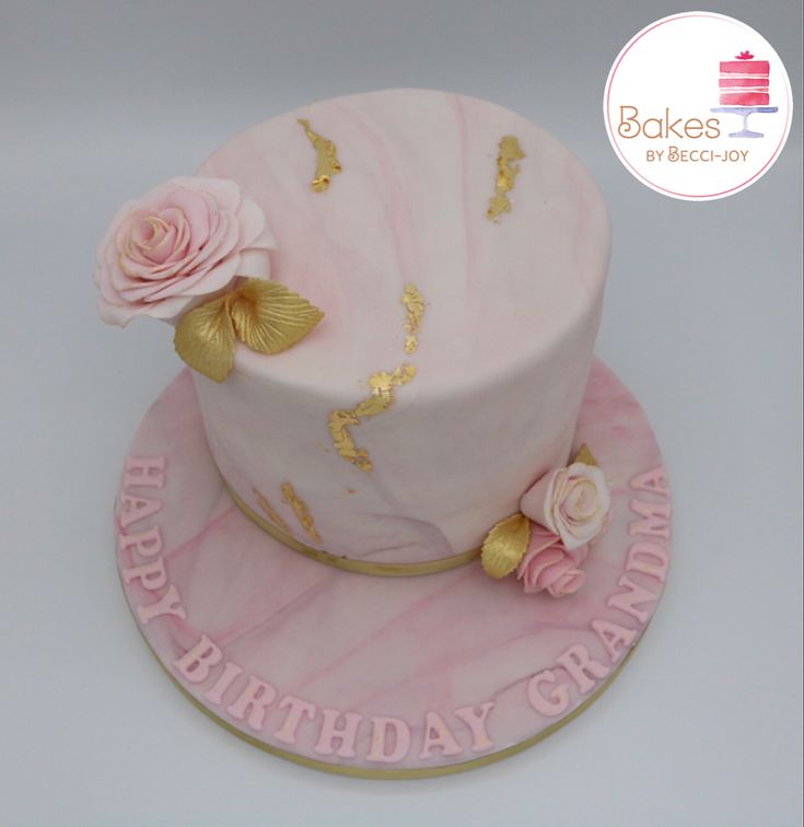 Edible Wafer Paper And Gold Leaf Cake In Pink And Gold Four Tiers Of Oink  And Gold With The Top Tier Covered In Pink Fondant The Second In 