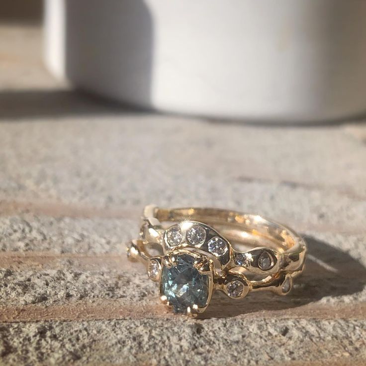 Montana sapphire and diamond wedding band and engagement ring set 
