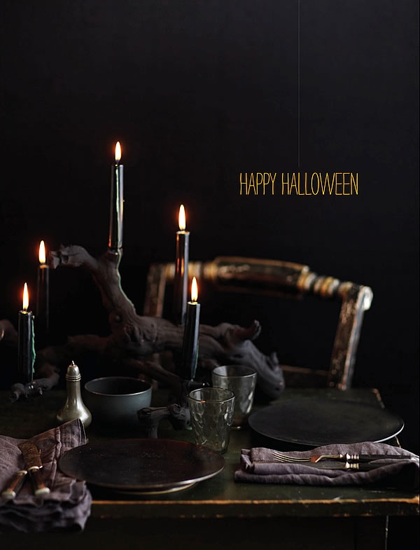 black halloween table setting dark dcor gnarly drift wood painted black bore holes for candle holders