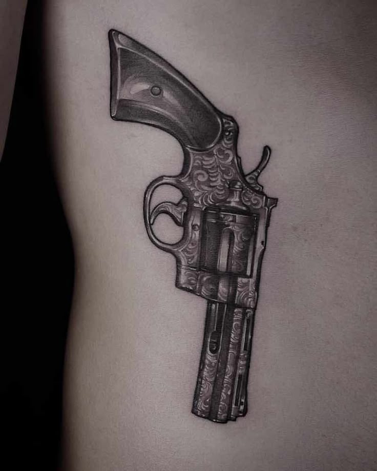 25 Of The Best Gun Tattoos Tattoo Insider Chicanas Tattoo Gun 25-of-the-best-gun-tattoos-tattoo-insider-chicanas-tattoo-gun