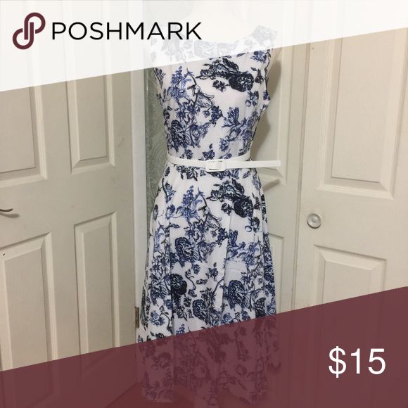 NWT Floral Dress Very nice pattern to this dress. Brand new, taken from package to photograph. Dress is not lined so and the fabric is thin so would probably need a slip underneath. Dresses