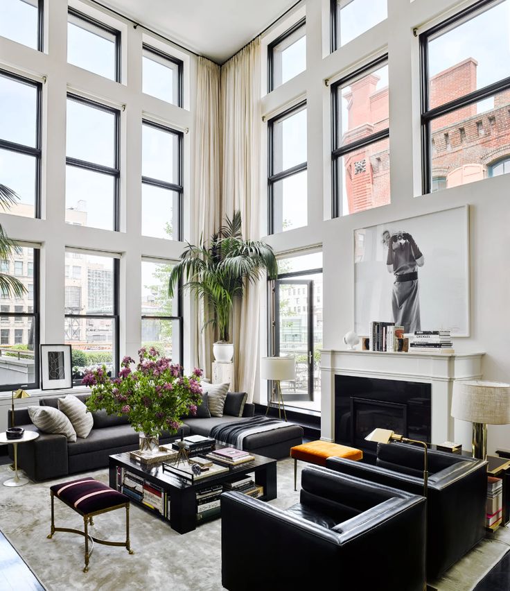 Tour Brian Atwood And Dr Jake Deutsch S Striking Nyc Apartment Double Height Living Room Black Leather Sofa Black Leather Sofa Living Room, Leather Sofas In Nyc