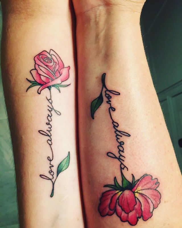 A Mother daughter tattoo I got for my 18th b-day. Mines on the left Moms is on t...