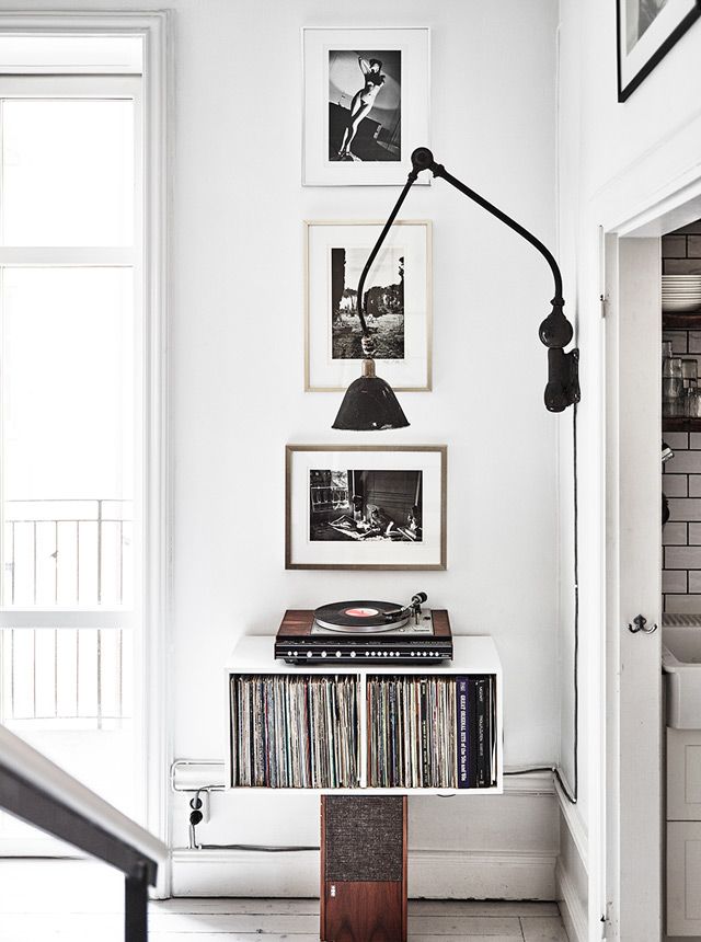 Interior unique bookcase design living room open doorway indoor white paint color decorative modern wall lamp decor laminate wood flooring wall décor Interior unique bookcase design living room open doorway indoor white paint color decorative modern wall lamp decor laminate wood flooring wall décor