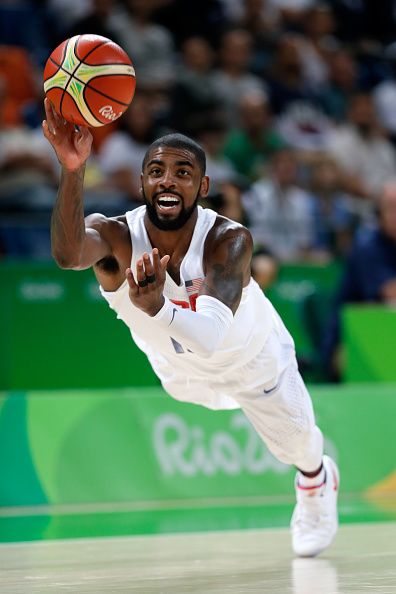 Kyrie Irving of United States passes the ball to teammate Kevin Durant not\u2026