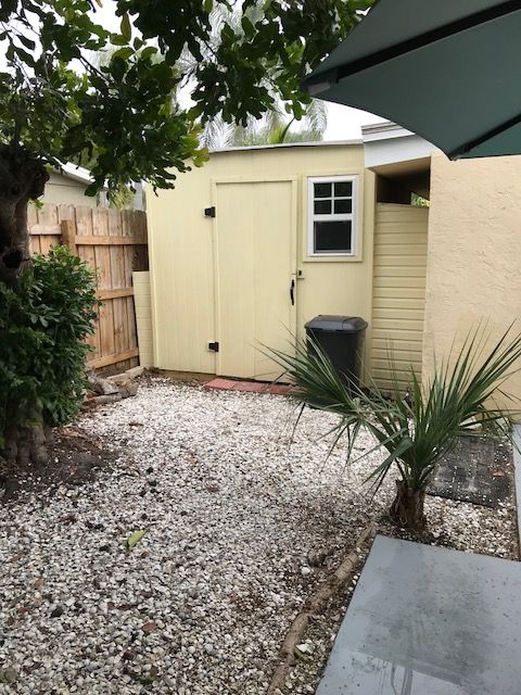 Florida Beach House Outdoor Storage Shed Yellow With A Window Florida Beach House Outdoor Storage Shed Yellow With A Window Crushed Shell Walkway Cottage Decor In 2018 Pinterest Cottages