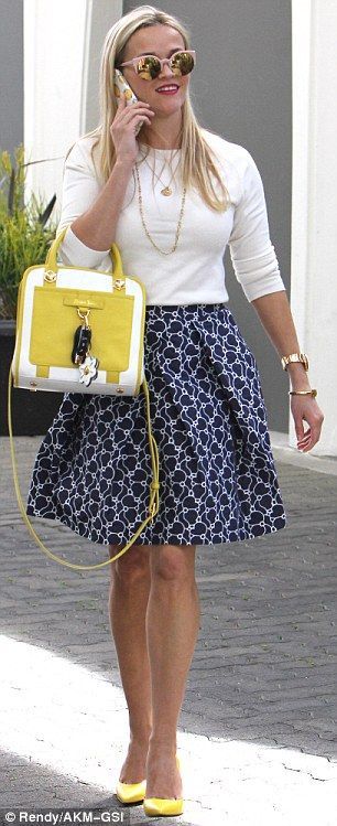 Reese Witherspoon looks fantastic at 40 in skirt from her own line