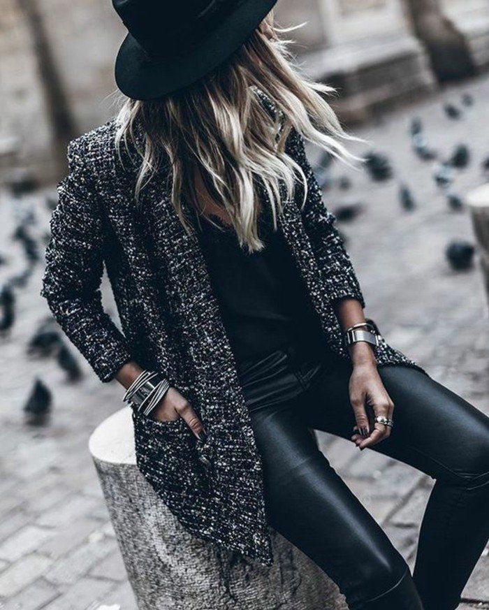 Amazing an all-black look, a leather slim and a long-brimmed hat, a straight coat, a …