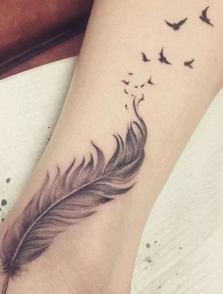 25 Symbolic Feather Tattoo Designs Meaning Feather Tattoos Feather C066044d89312c07bd19c8c1a6570803