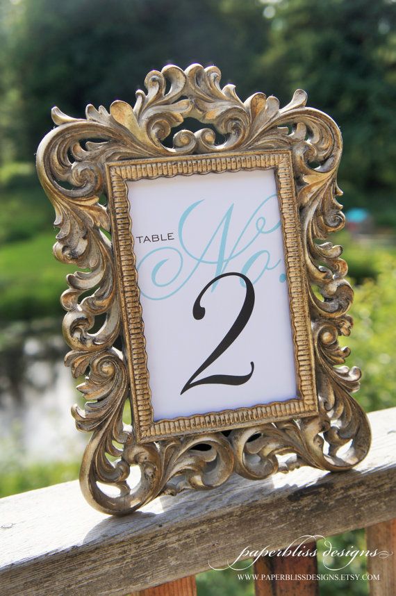 design these custom table numbers to compliment your wedding décor