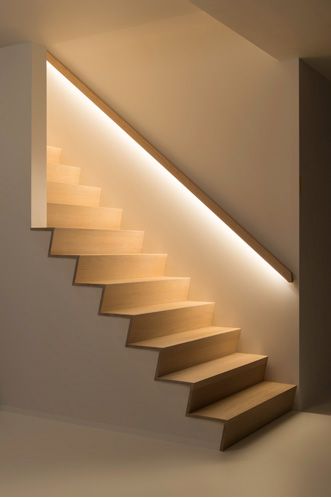 a stair case with lights on the side