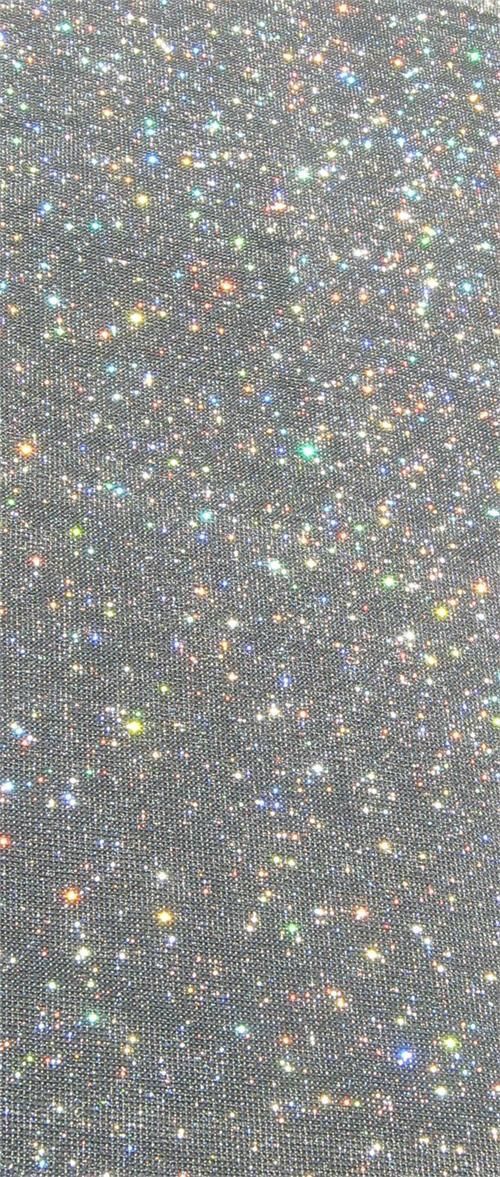 the back side of a computer screen with lots of glitter on it's surface