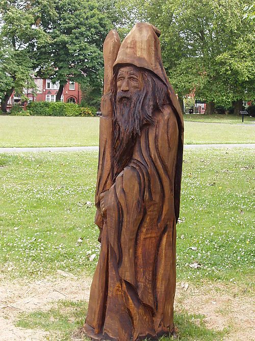 Chainsaw carved wizards the wizard of old moat park Chainsaw carved wizards the wizard of old moat park