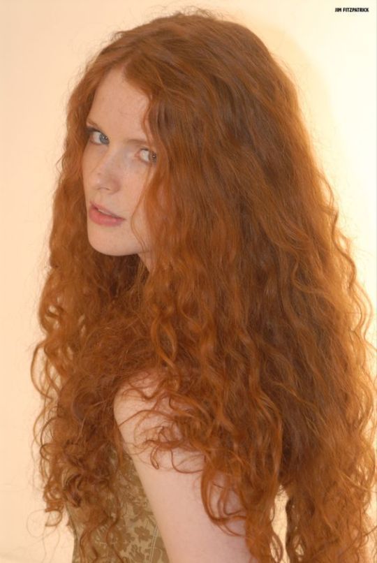 Redhead long hair curly screaming