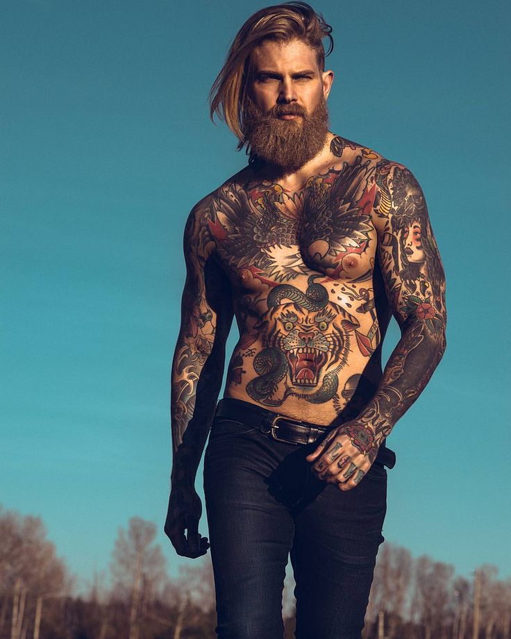 Speaking the man with blonde hair and scruffy beard Not man with blonde hair and scruffy beard