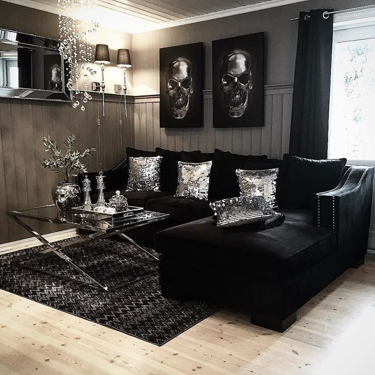 Living Room - Black and Gold; Rich tones; Photo frames lined vertically; Coffee Living Room - Black and Gold; Rich tones; Photo frames lined vertically; Coffee