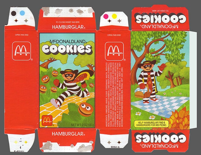 1978 McDonalds MCDONALDLAND Cookies empty box with a Ronald McDonald bike card 1978 McDonalds MCDONALDLAND Cookies empty box with a Ronald McDonald bike card