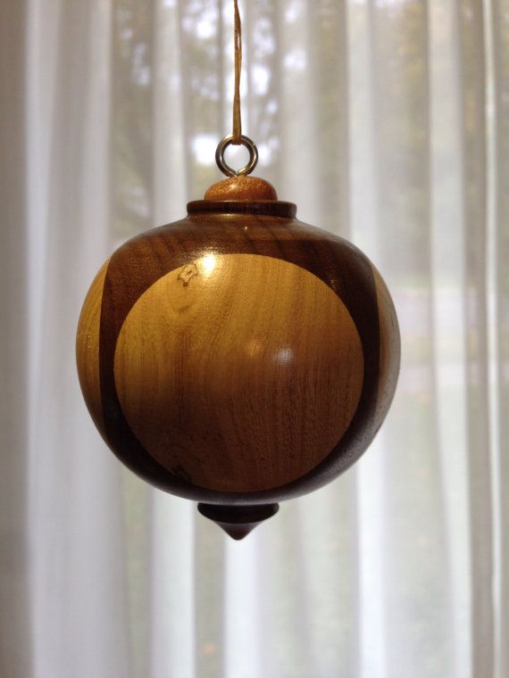 segmented christmas ornament made of walnut and by turning wood christmas ornaments