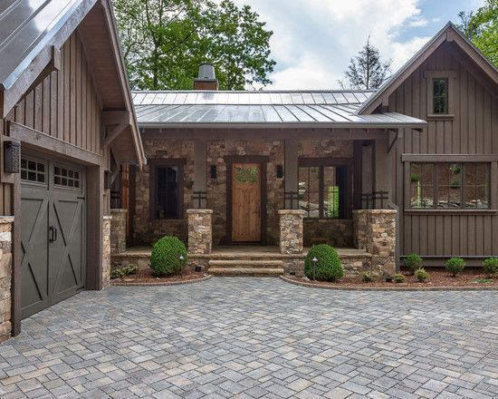 Rustic Exterior of Home with exterior stone floors, Pathway, Raised beds Rustic Exterior of Home with exterior stone floors, Pathway, Raised beds