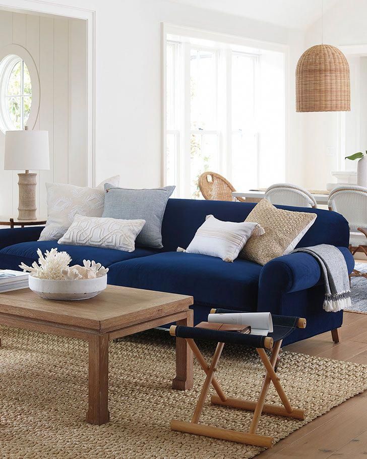 Coastal Cottage Living Room With Navy Sofa Thoughts On Holiday Summer Novelties By Serena Li Blue Sofas Living Room Blue Living Room Decor Blue Sofa Living