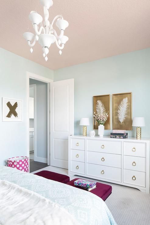 Best Ceiling Paint Color Ideas And How To Choose It A Pink Ceiling Beautifully Complements Light Blue Walls In This Stylish S Bedroom Decorated With White And Gold Feather Art Pieces Mounted Above
