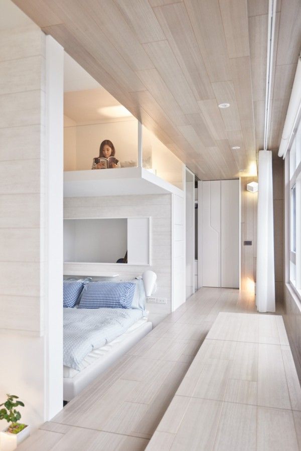 White walls and in floor storage make this creative house design special White walls and in floor storage make this creative house design special