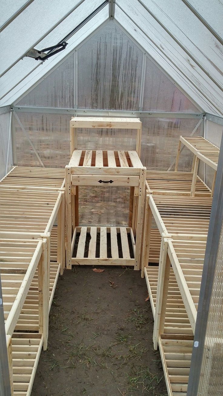 Greenhouse shelves with potting bench built by Ryan Ganger. All