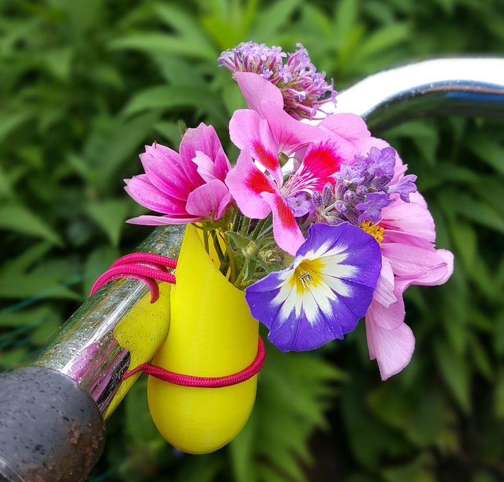 Cute little plastic vase for on the handlebar of your bicycle. 3D
