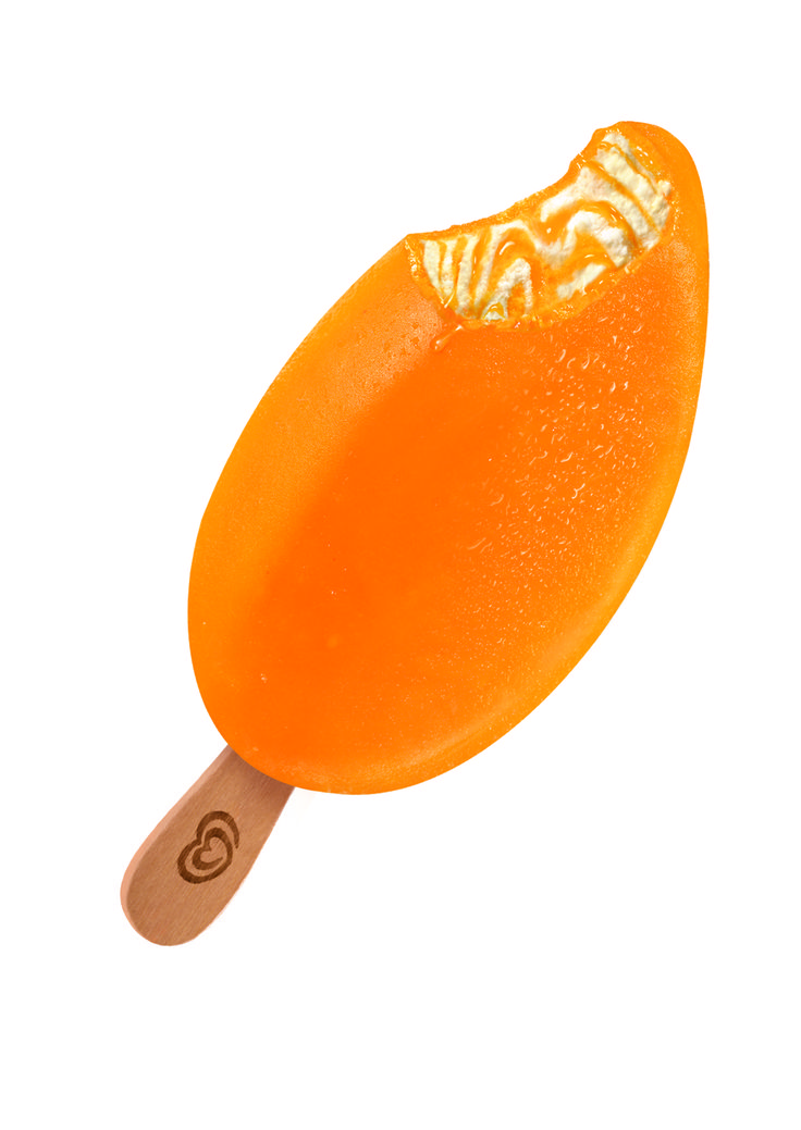 an orange lollipop with a wooden stick sticking out of it's side