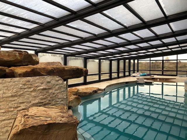 Ohio Pool Enclosure Manufactured By Roll A Cover Indoor Outdoor Pool Residential Pool Swimming Pool Enclosures