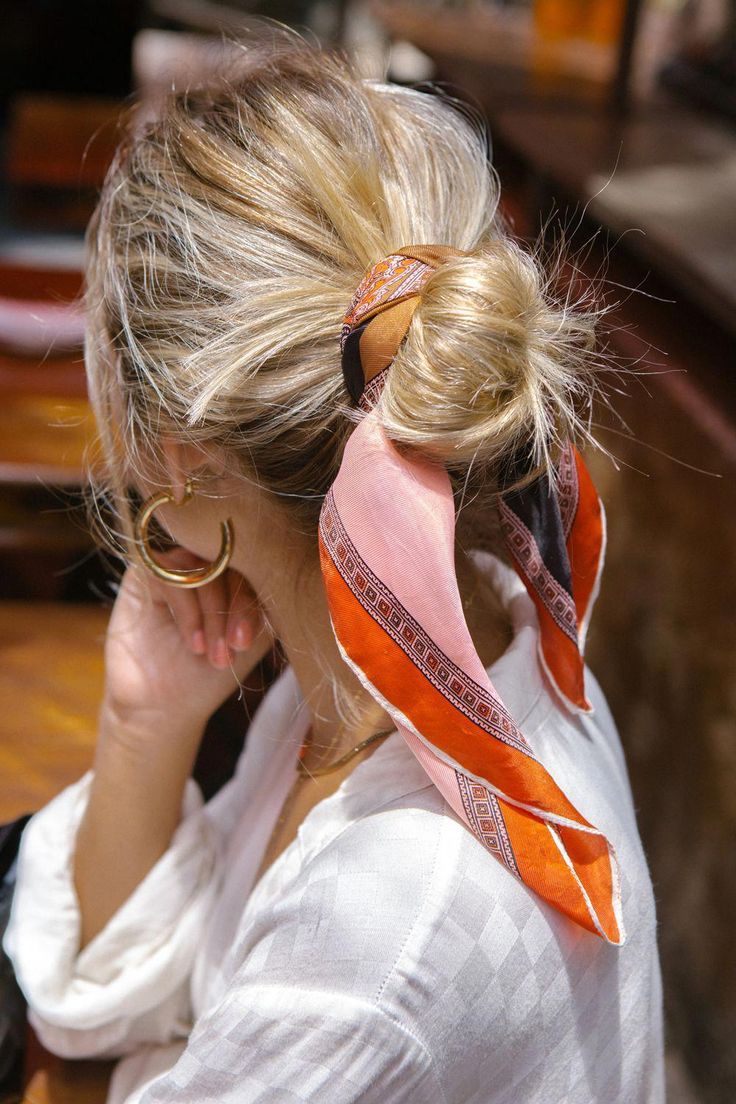 the trendiest way to wear your hair: tie it up in a printed scarf, hair bun tied… the trendiest way to wear your hair: tie it up in a printed scarf, hair bun tied…