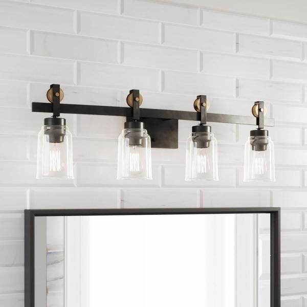 Knollwood 4 Light Antique Bronze Linear Chandelier with Vintage Brass Accents and Clear Glass Shades Knollwood 4 Light Antique Bronze Linear Chandelier with Vintage Brass Accents and Clear Glass Shades