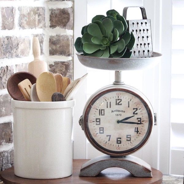 This Vintage Style Scale Clock Is Perfect For Your Farmhouse Kitchen Its Made Of Metal With A Rustic Finish It Features Functioning Face On Each This Vintage Style Scale Clock Is Perfect For Your Farmhouse Kitchen Its Made Of Metal With A Rustic Finish It Features Functioning Face On Each